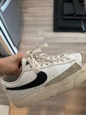 Nike Women’s White Leather Low-Top Sneaker with Black Swoosh